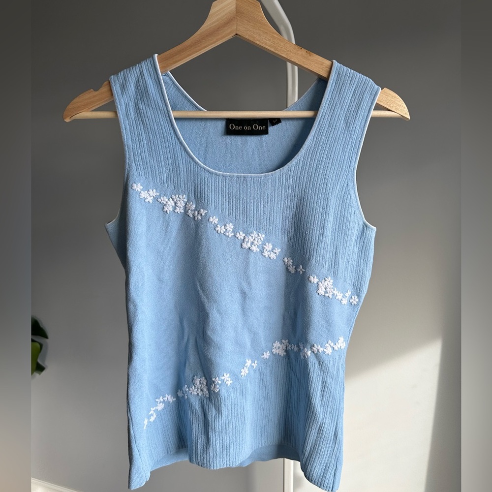 Y2K style blue sleeveless top